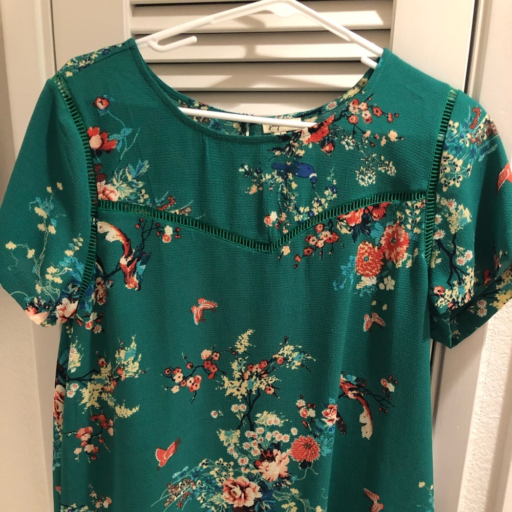 Green floral top size large.